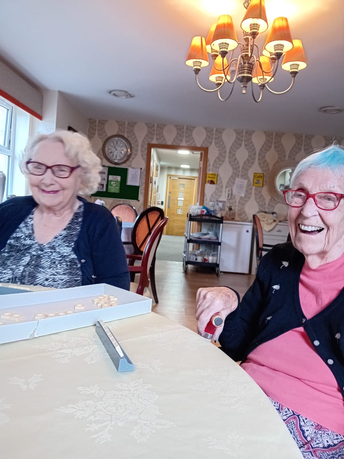 Residents enjoying a game of Scrabble
