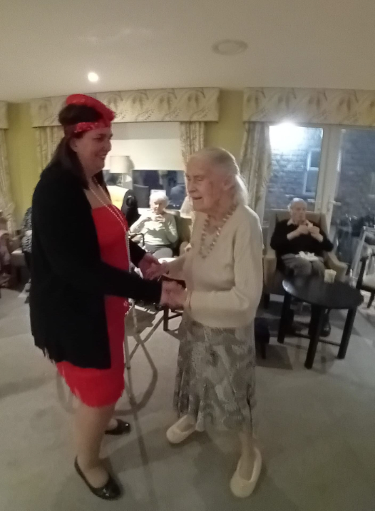 resident dancing with one of our lynne