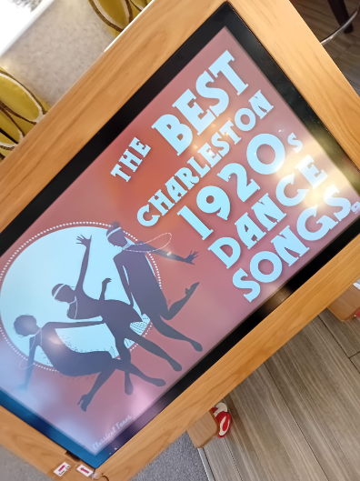 themed songs on a screen