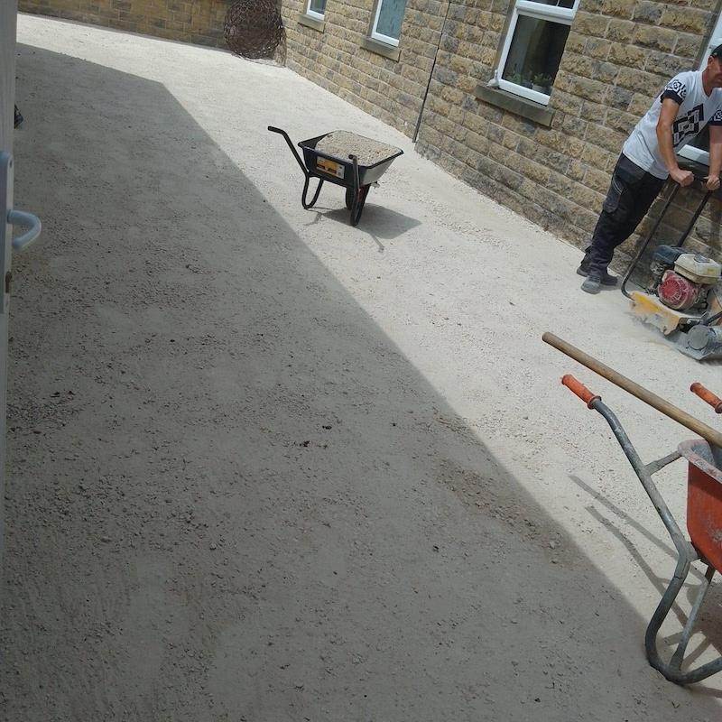 builders surfacing our outdoor courtyard